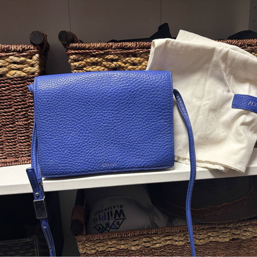 Auxiliary Blue Leather Crossbody Bag from Aritzia